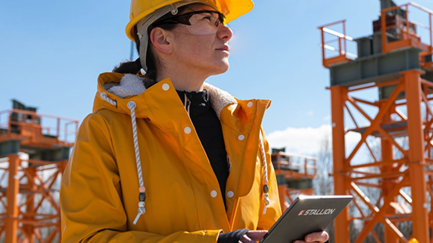 Woman wearing safety equipment at construction site