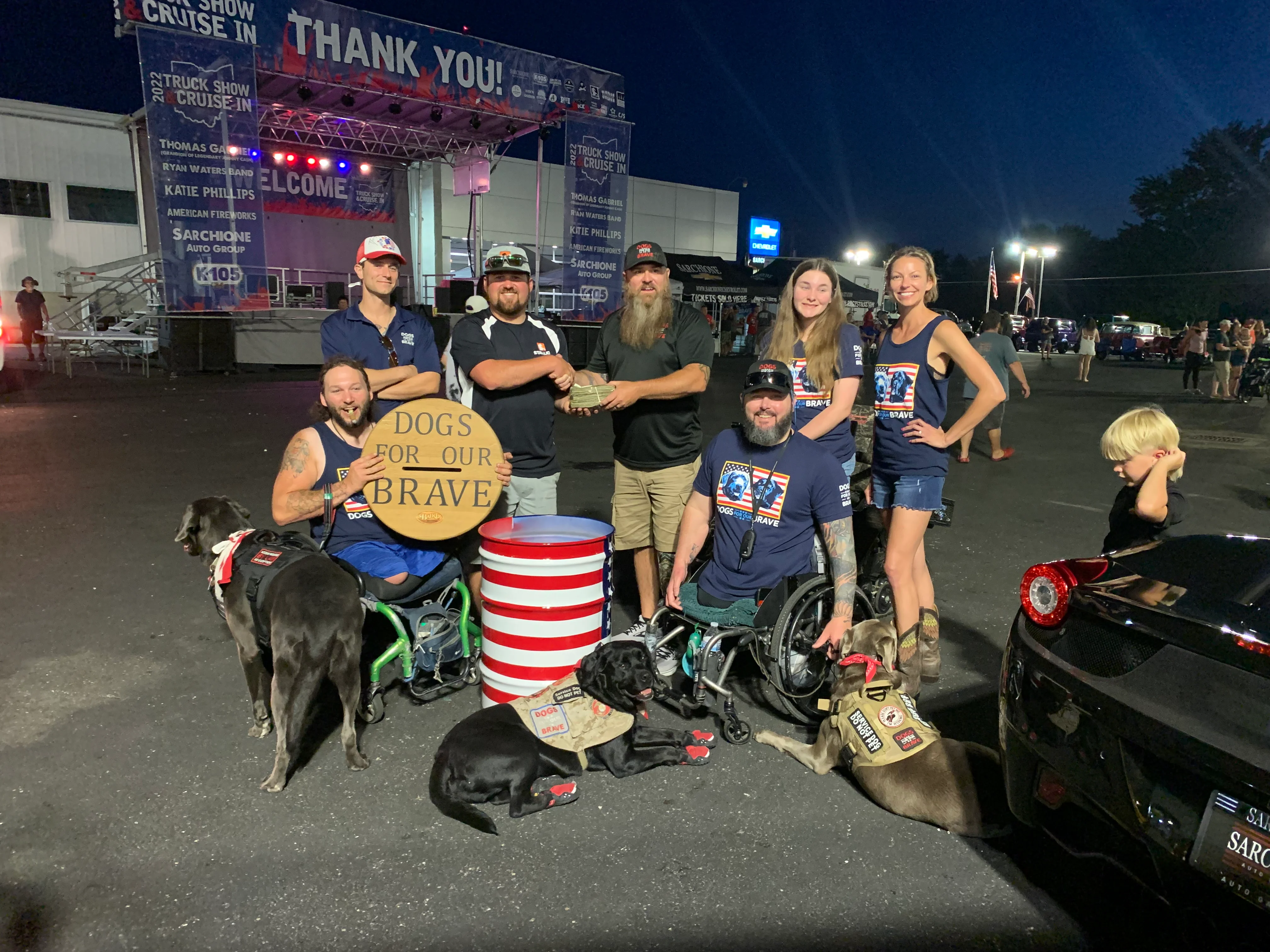 Employees volunteering for Dogs for our Brave